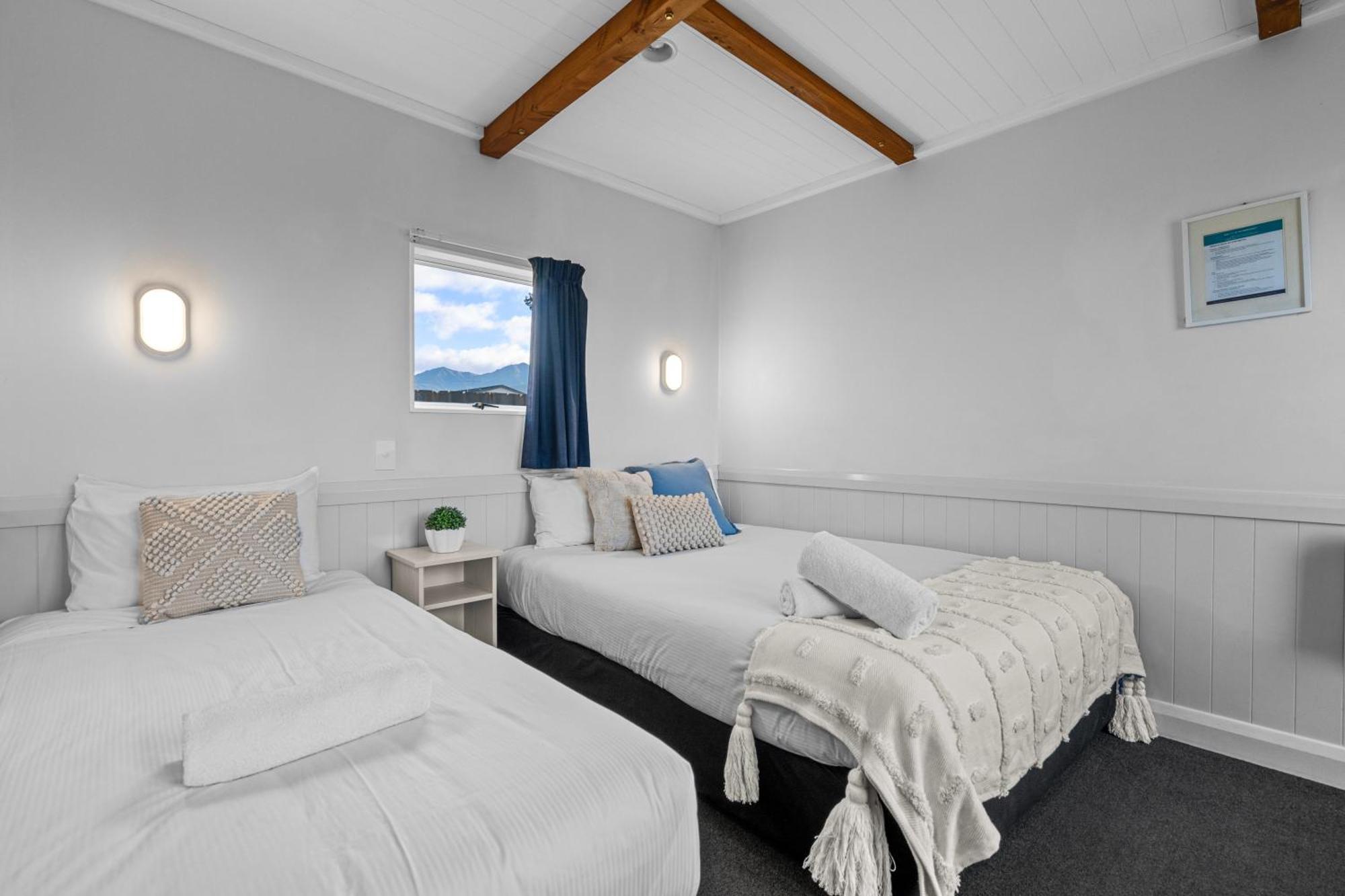 Tasman Holiday Parks - تي أناو المظهر الخارجي الصورة A bedroom at the hotel